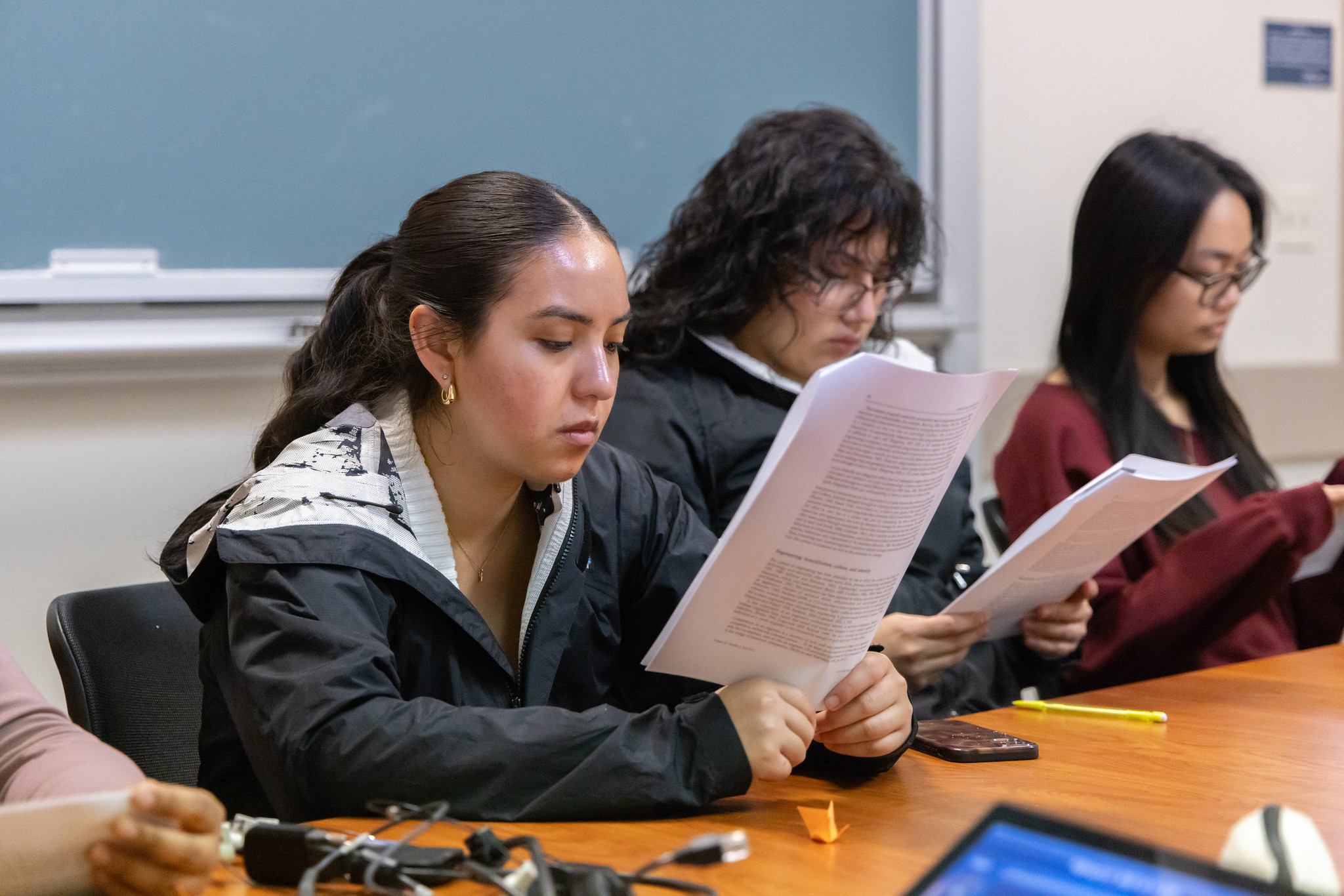 Students read a journal article