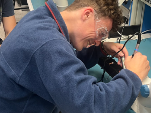 Students soldering