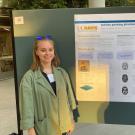 Ekaterina Shanina standing in front of research poster